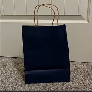 Heavy weight navy Kraft gift bags. 100/case
